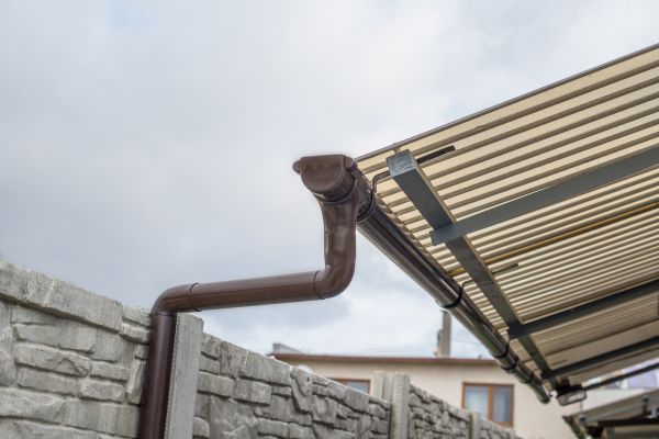 Plastic Downspout Installation in Blue Springs